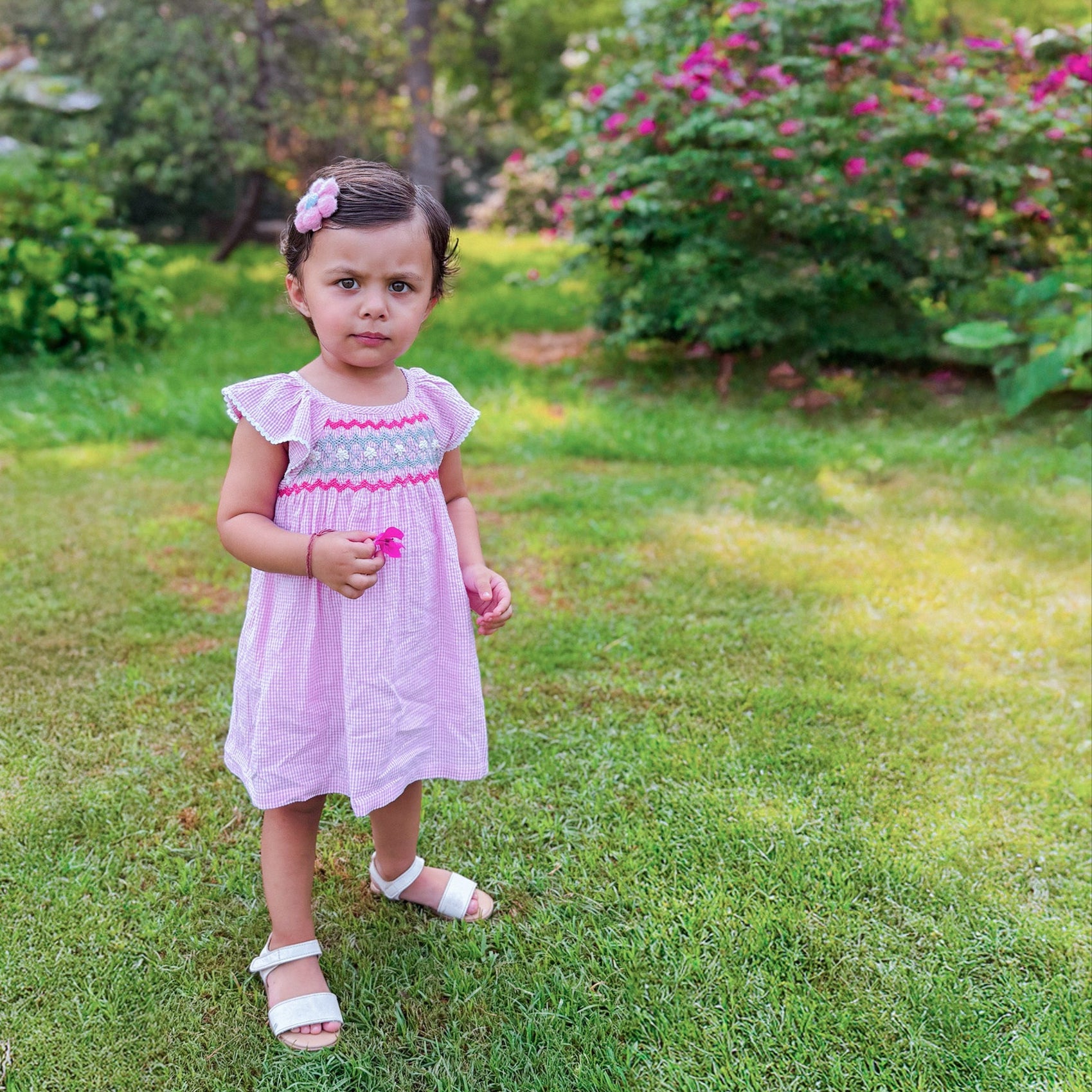 Girls smocked pink gingham seersucker cotton dress – Clara by Erde, ages 2–6