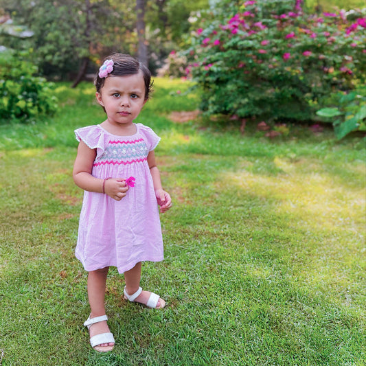 Girls smocked pink gingham seersucker cotton dress – Clara by Erde, ages 2–6